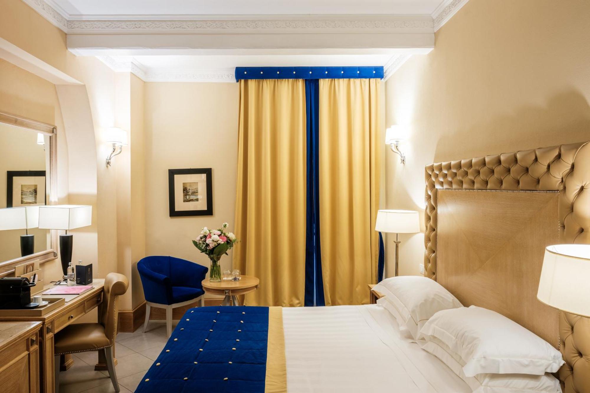 Villa Tolomei Hotel & Resort Флоренция Экстерьер фото A room at the hotel