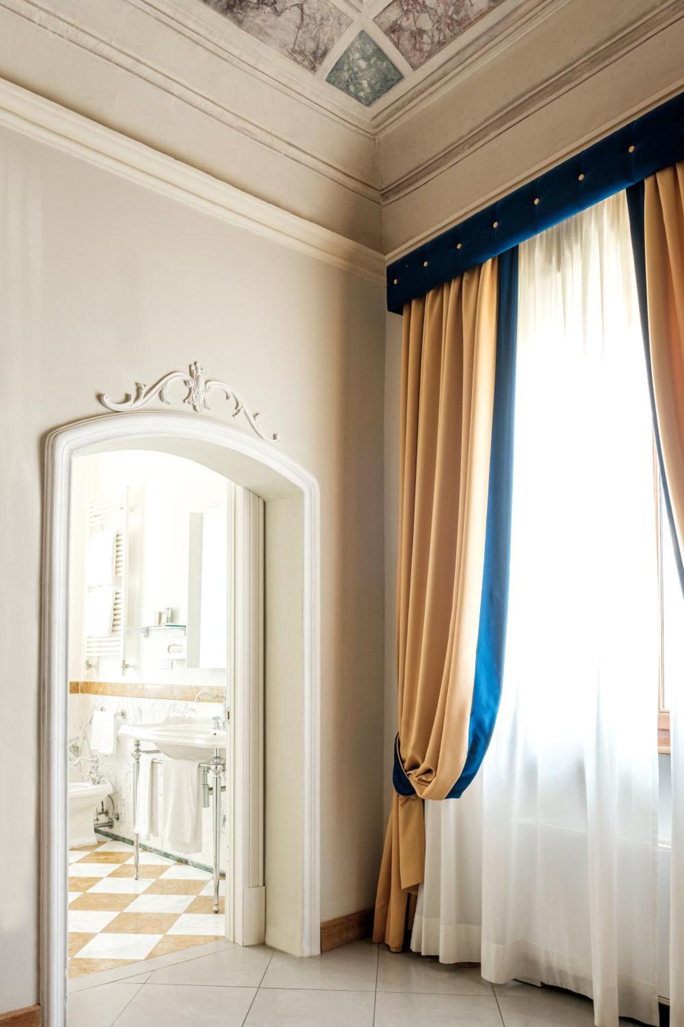 Villa Tolomei Hotel & Resort Флоренция Экстерьер фото A curtain