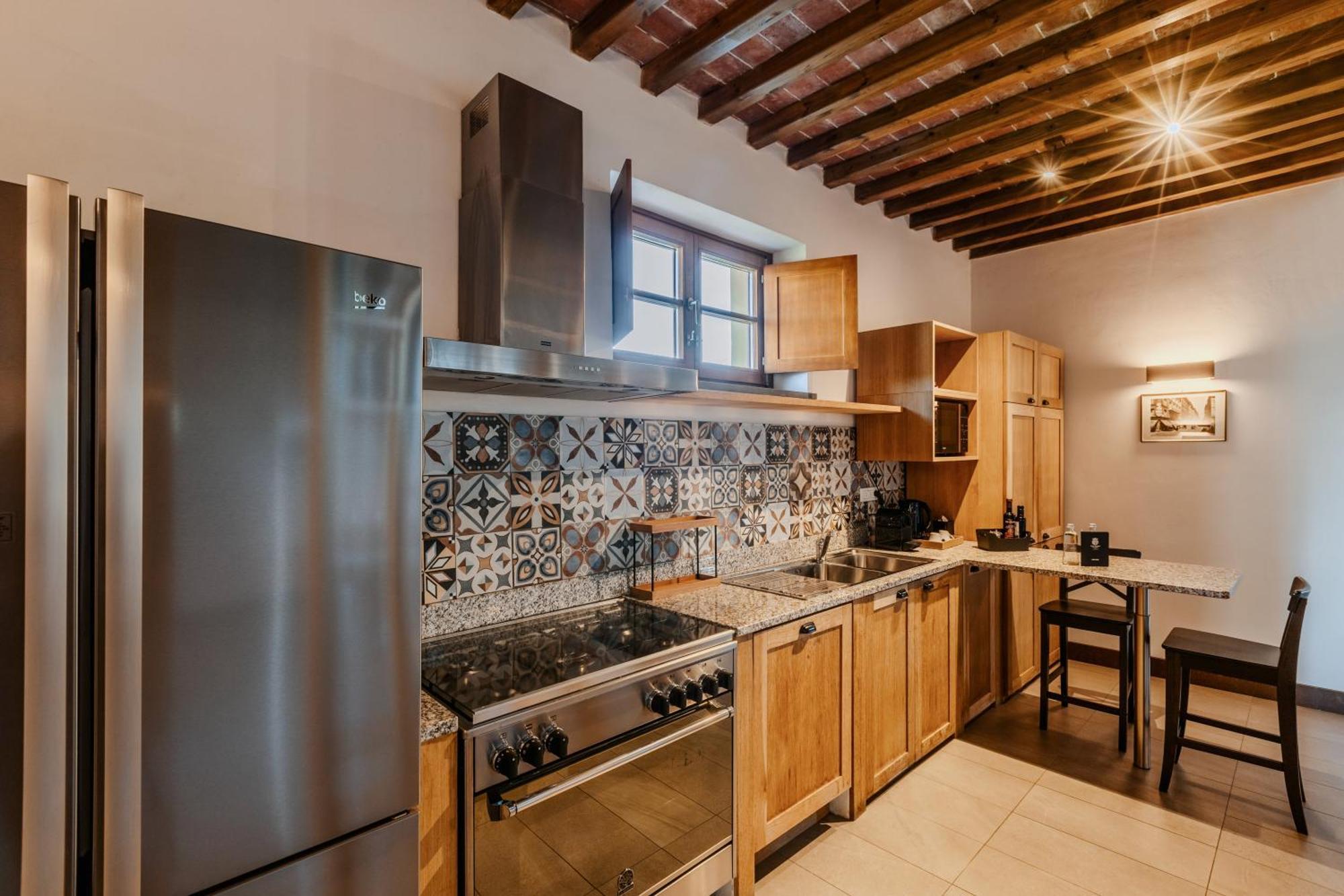 Villa Tolomei Hotel & Resort Флоренция Экстерьер фото Kitchen