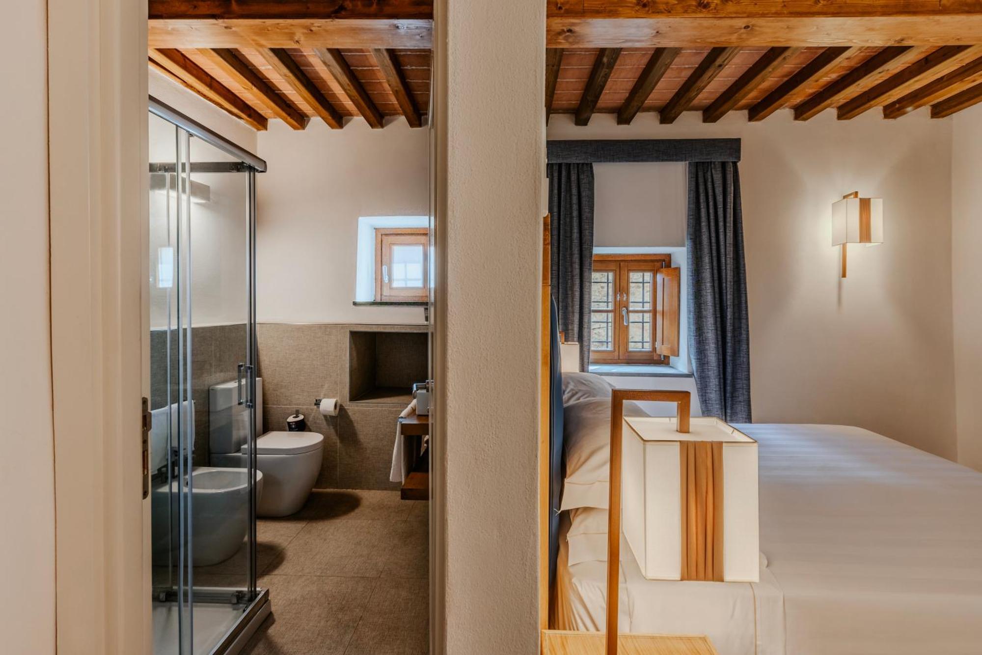 Villa Tolomei Hotel & Resort Флоренция Экстерьер фото A room at the hotel