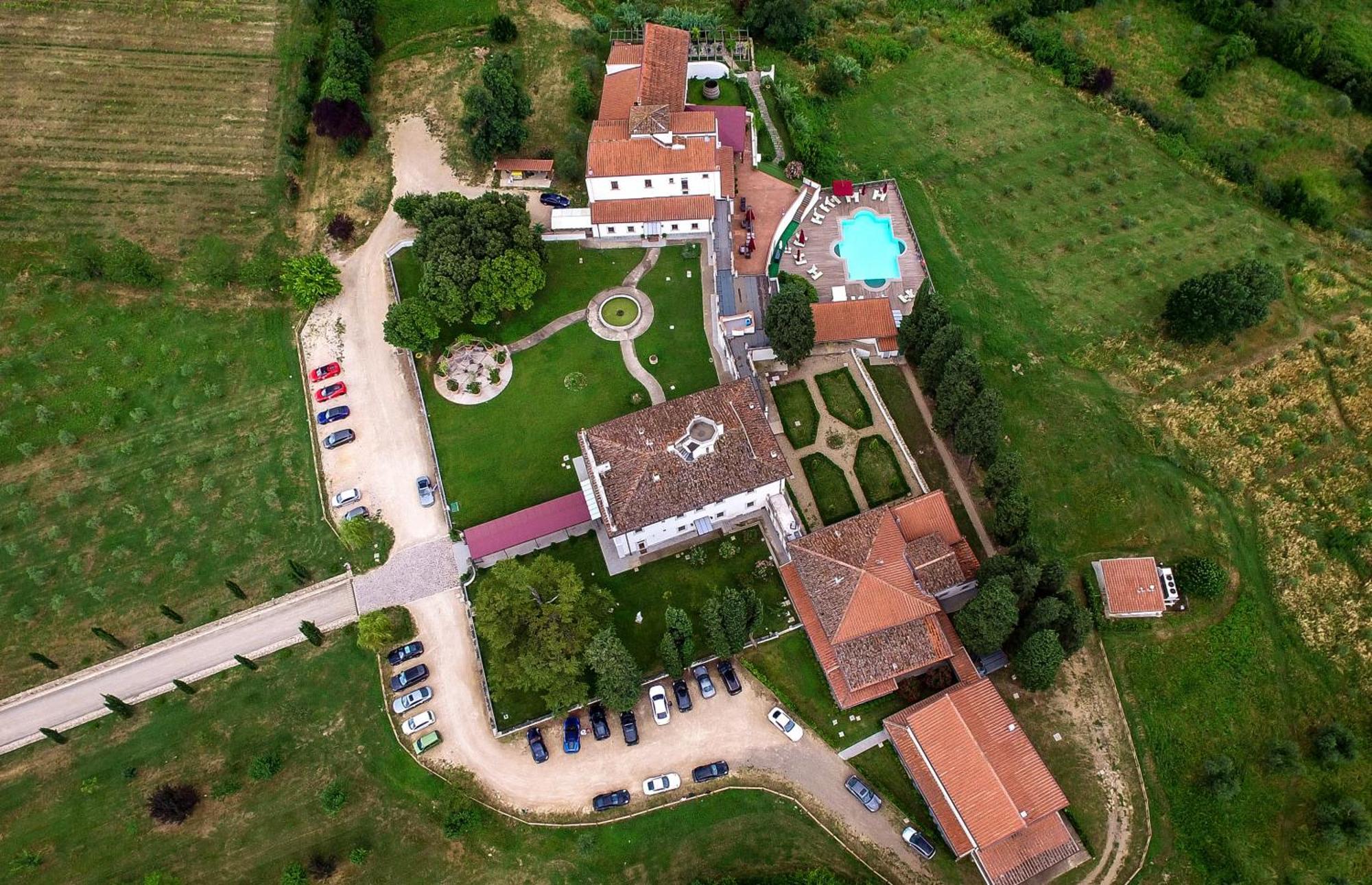 Villa Tolomei Hotel & Resort Флоренция Экстерьер фото Aerial view of the castle