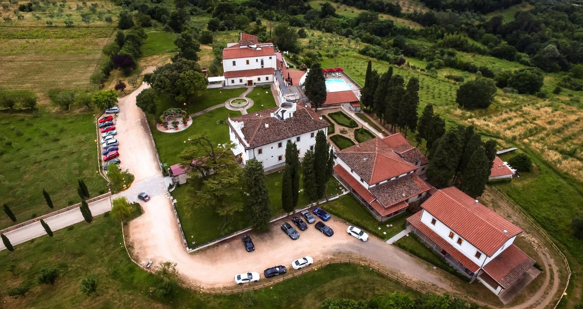 Villa Tolomei Hotel & Resort Флоренция Экстерьер фото Aerial view of the monastery